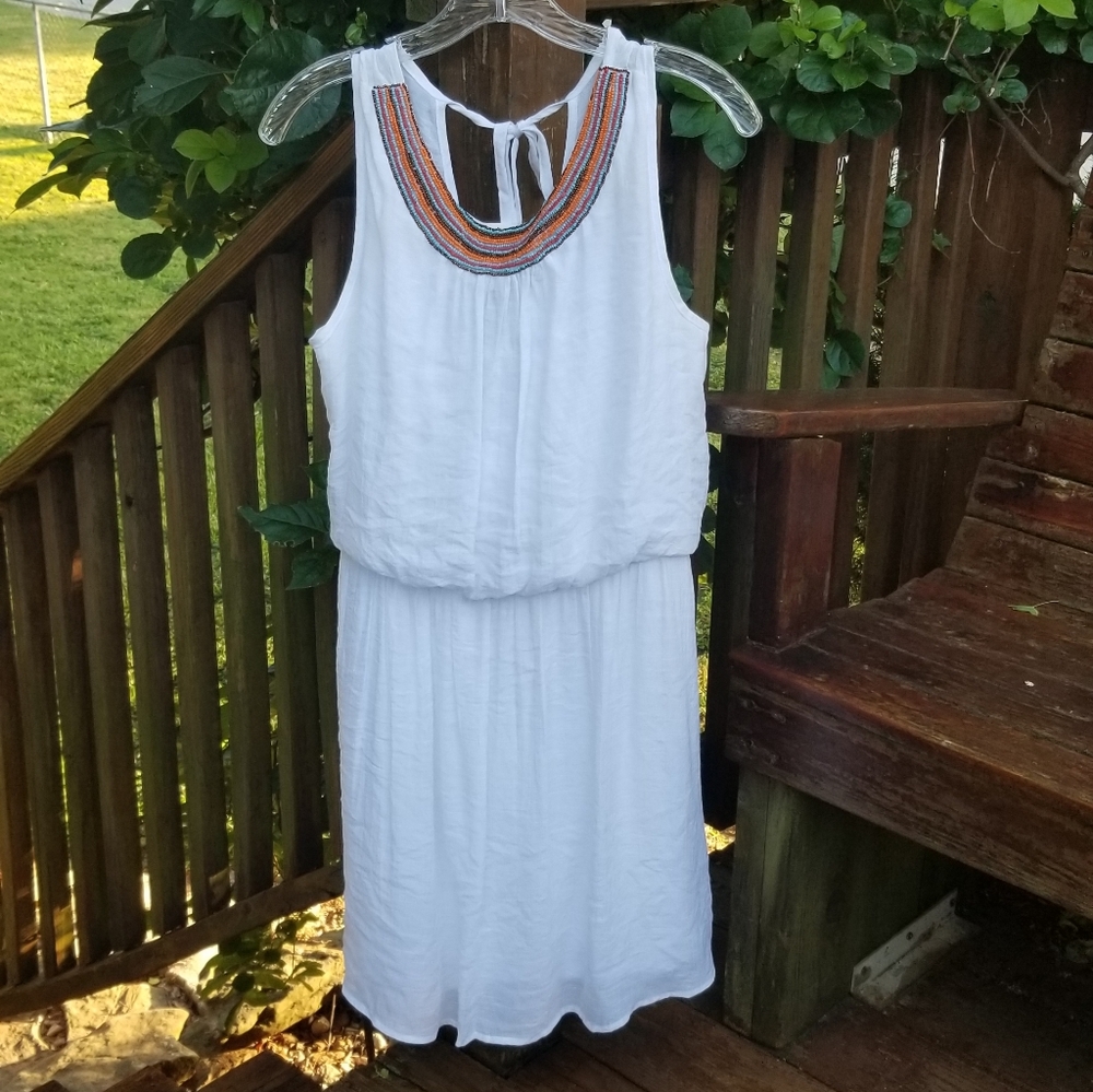 White dress with beaded neckline